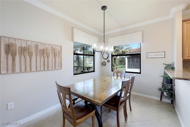 tiled dining room featuring crown molding and an inviting chandelier