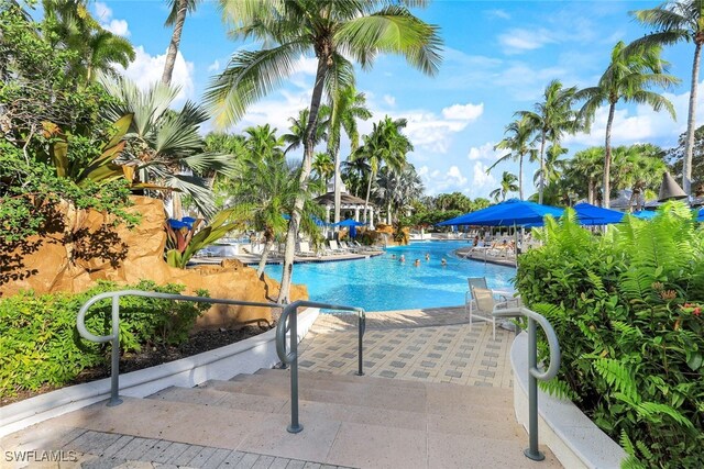 view of swimming pool with a patio