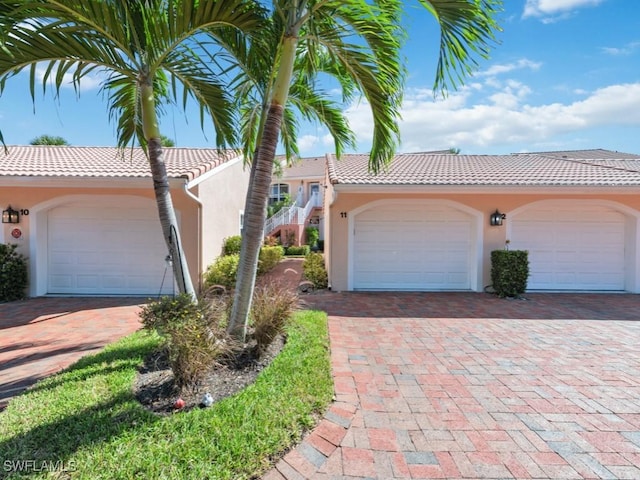 view of front of property with a garage