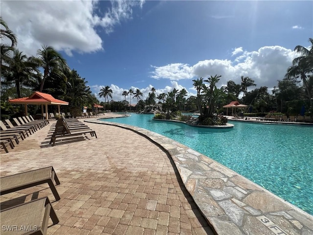 view of swimming pool featuring a gazebo and a patio area