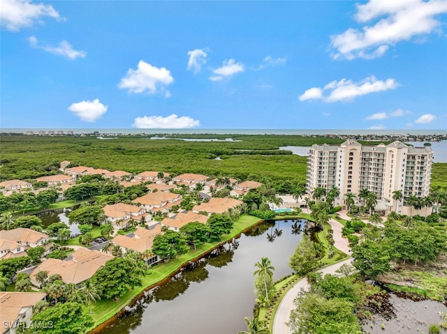 drone / aerial view with a water view