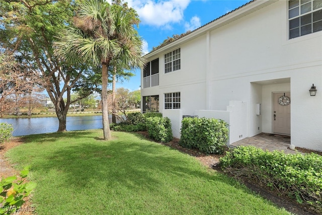 view of yard with a water view