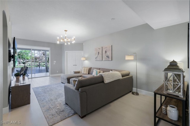 living room featuring a chandelier