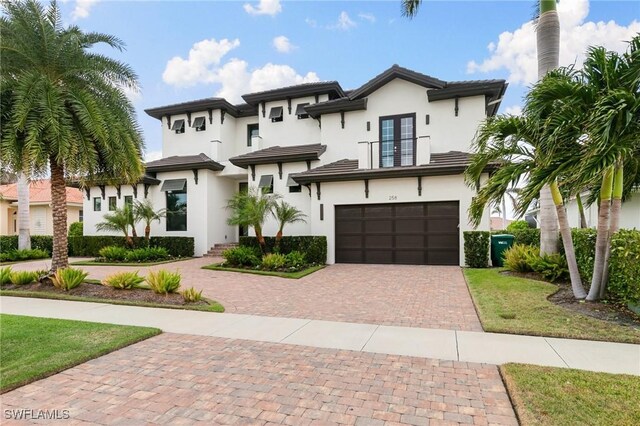 view of front of home with a garage