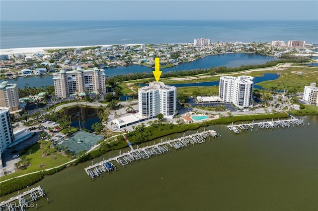 birds eye view of property featuring a water view