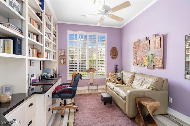 office area featuring ornamental molding, ceiling fan, and light hardwood / wood-style floors