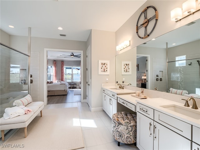 bathroom featuring vanity, tile patterned floors, ceiling fan, and walk in shower