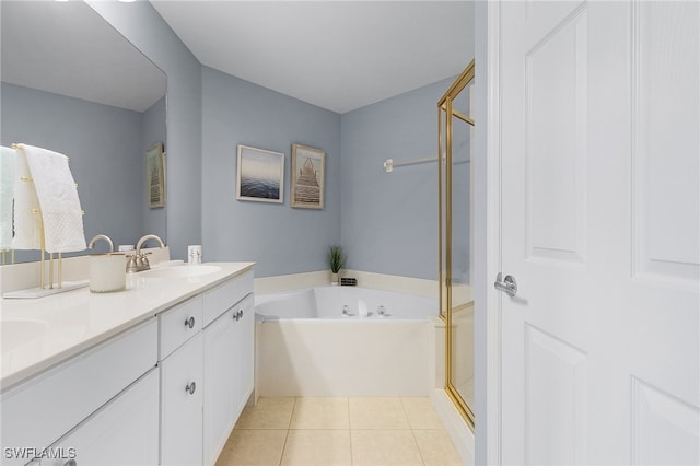 bathroom featuring vanity, tile patterned floors, and separate shower and tub