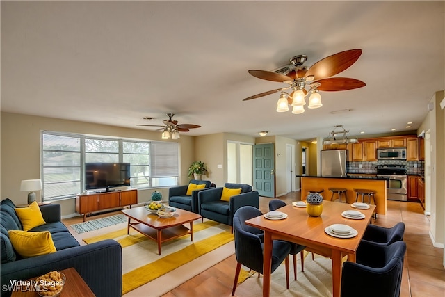 interior space featuring ceiling fan and light hardwood / wood-style floors