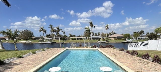 view of pool with a water view