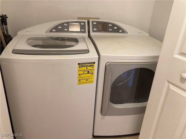 laundry room featuring laundry area and separate washer and dryer