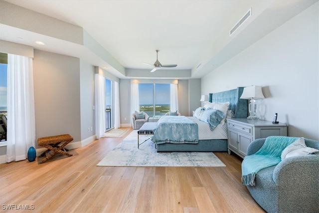 bedroom featuring light hardwood / wood-style floors and ceiling fan