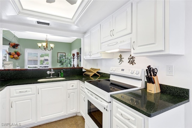 kitchen featuring custom exhaust hood, white cabinets, electric stove, a notable chandelier, and sink