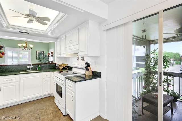 kitchen with custom exhaust hood, white cabinetry, white electric range oven, a tray ceiling, and sink