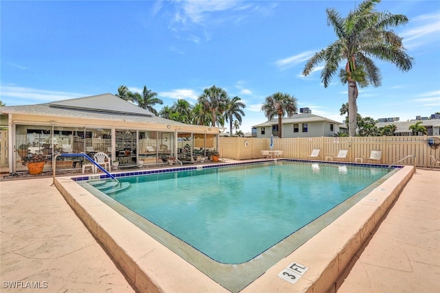 view of pool featuring a patio area