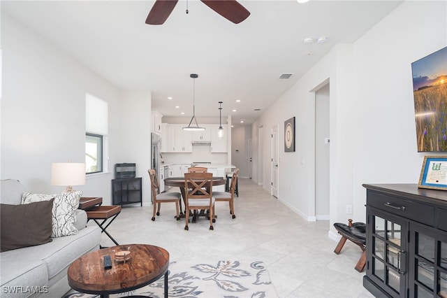 living room with ceiling fan