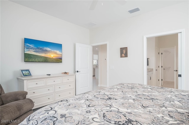 bedroom featuring connected bathroom and ceiling fan