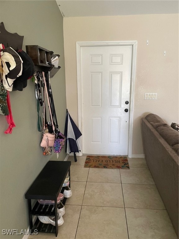 mudroom featuring light tile patterned floors