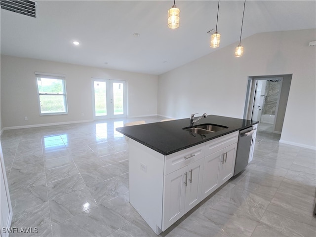 kitchen with dishwasher, sink, decorative light fixtures, a kitchen island with sink, and white cabinets