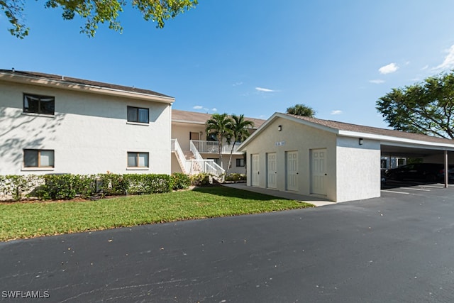 view of building exterior with a carport