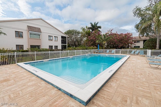 view of pool featuring a patio