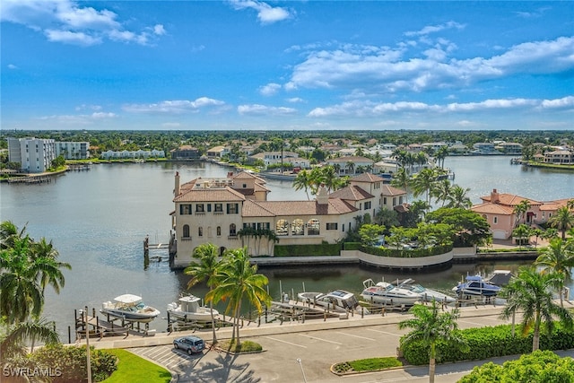 birds eye view of property featuring a water view