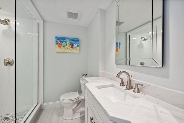 4031 Gulf Shore Blvd N Unit 95, Naples, FL 34103 - full bathroom featuring a stall shower, vanity, toilet, and baseboards