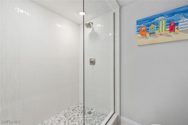 4031 Gulf Shore Blvd N Unit 95, Naples, FL 34103 - full bathroom with a stall shower and baseboards