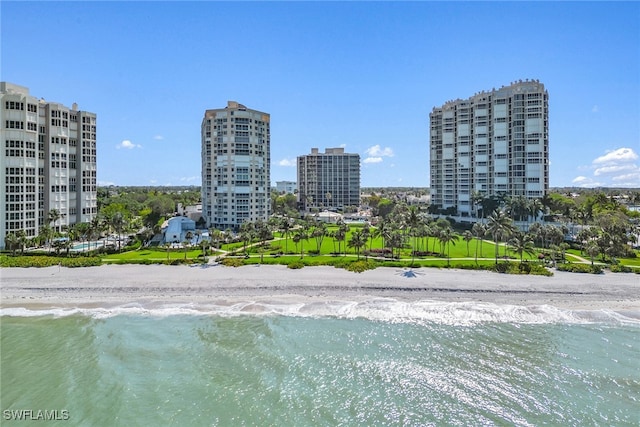 bird's eye view with a view of the beach and a water view