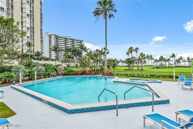 view of swimming pool with a patio area