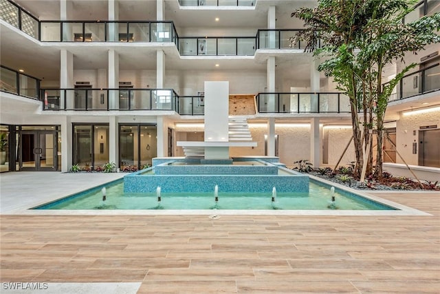 4031 Gulf Shore Blvd N Unit 95, Naples, FL 34103 - view of swimming pool with a pool with connected hot tub