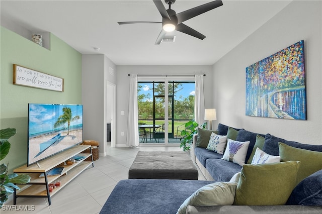 living room with light tile patterned floors and ceiling fan