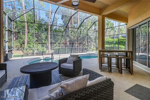 view of patio / terrace with glass enclosure