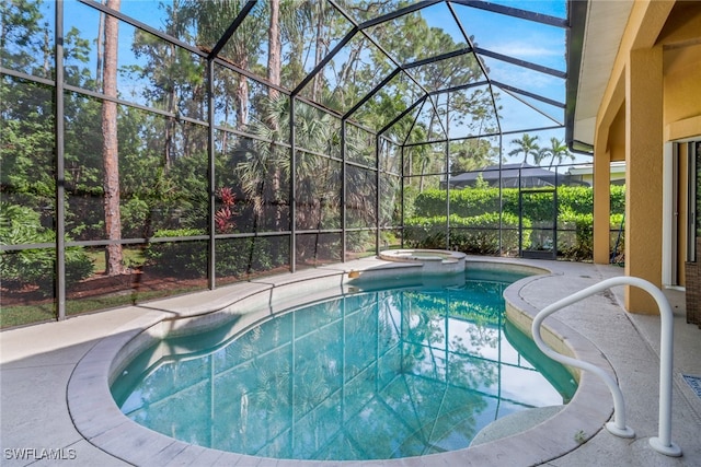 view of swimming pool featuring a lanai, a patio area, and an in ground hot tub