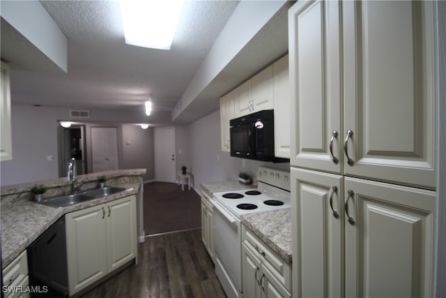 kitchen featuring sink, black appliances, white cabinets, a textured ceiling, and dark hardwood / wood-style flooring