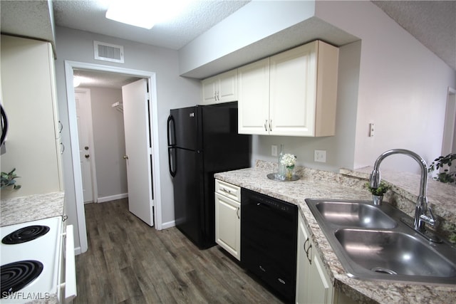 kitchen featuring white cabinets, dark hardwood / wood-style flooring, a textured ceiling, black appliances, and sink