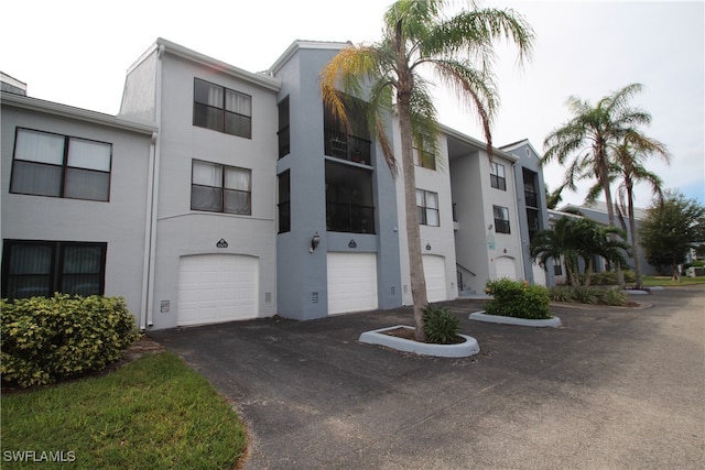 view of building exterior with a garage