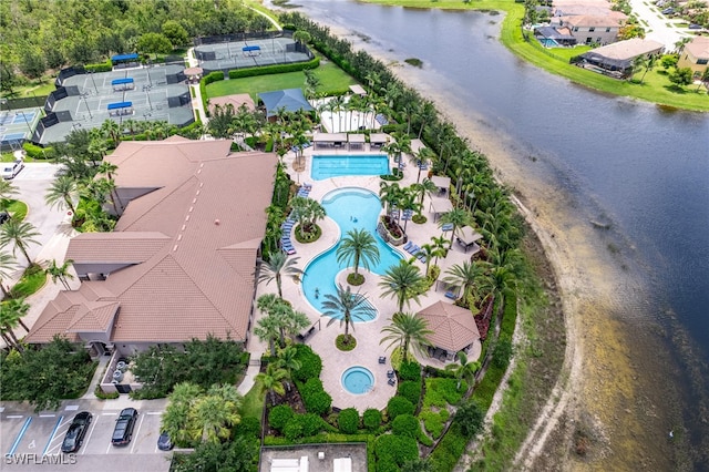 birds eye view of property featuring a water view