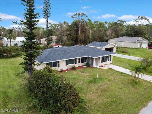 ranch-style house with a front lawn