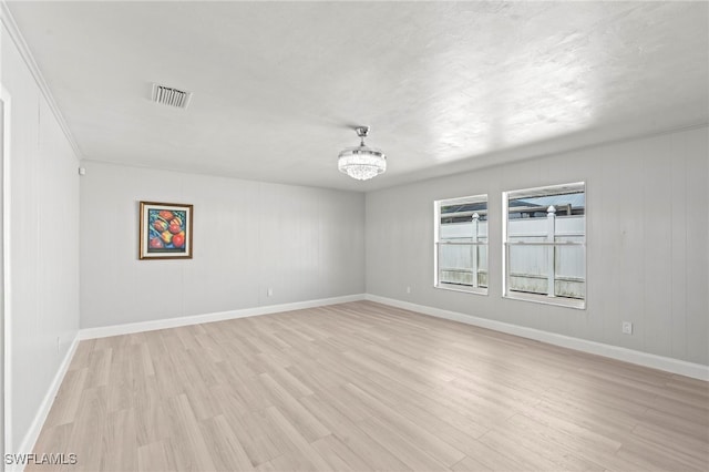 unfurnished room featuring light wood-type flooring