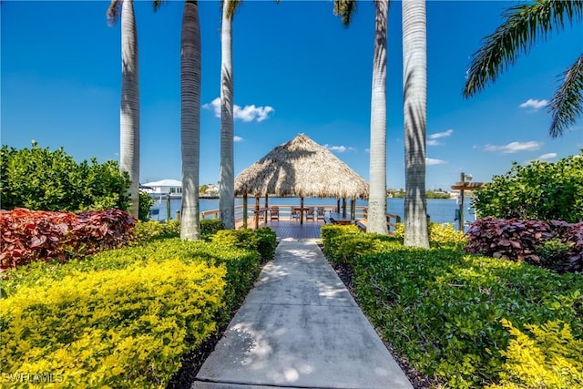 view of home's community featuring a gazebo and a water view