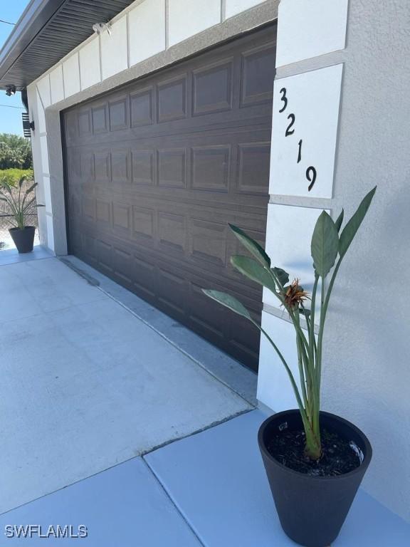 garage with driveway