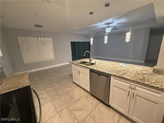 kitchen with dishwasher, light stone counters, decorative light fixtures, white cabinetry, and a sink