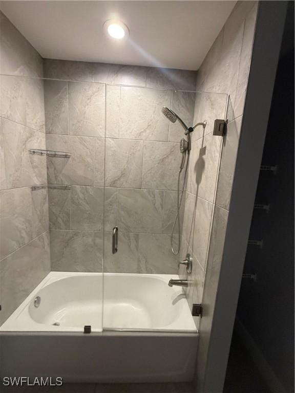 full bathroom with recessed lighting and bath / shower combo with glass door