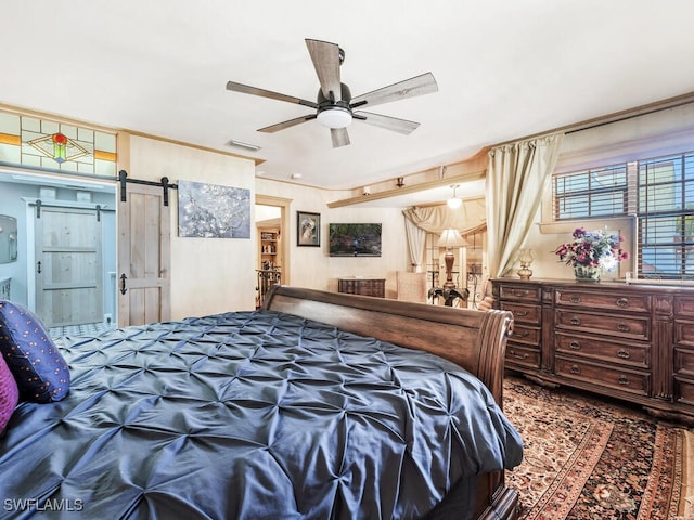 bedroom with a barn door