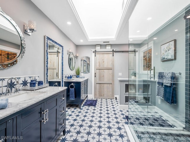 bathroom with vanity and an enclosed shower