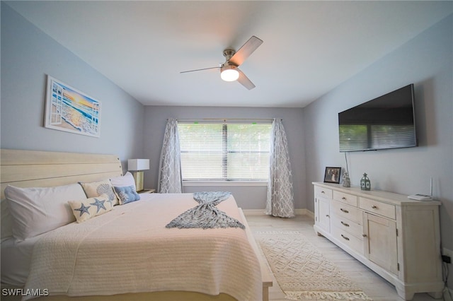 bedroom featuring ceiling fan and light hardwood / wood-style floors