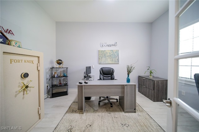 home office with light wood-type flooring