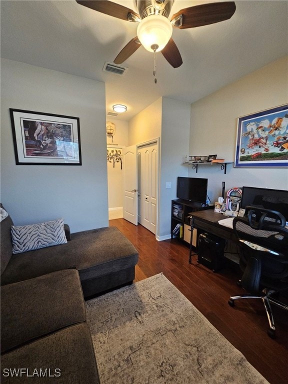 office featuring dark wood-type flooring and ceiling fan