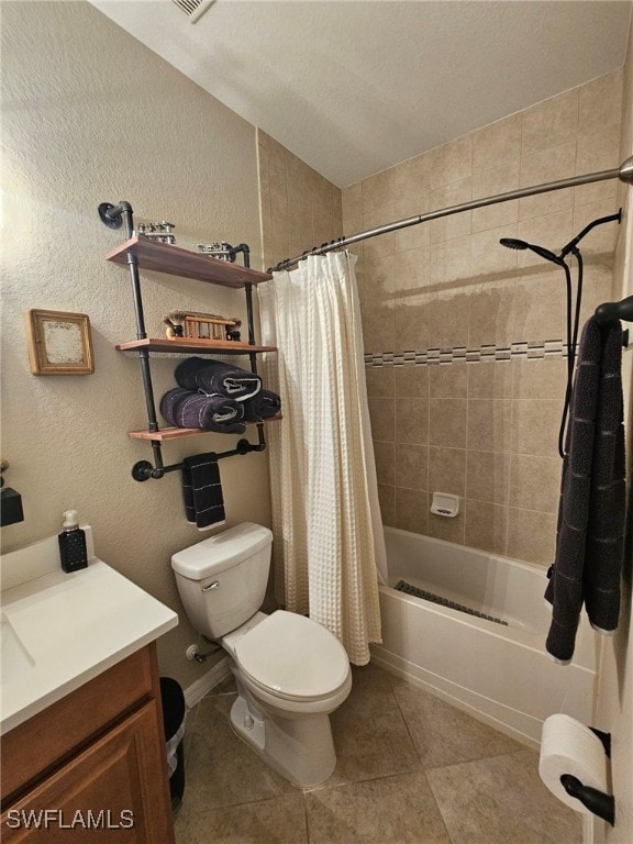 full bathroom with vanity, toilet, tile patterned flooring, and shower / tub combo with curtain